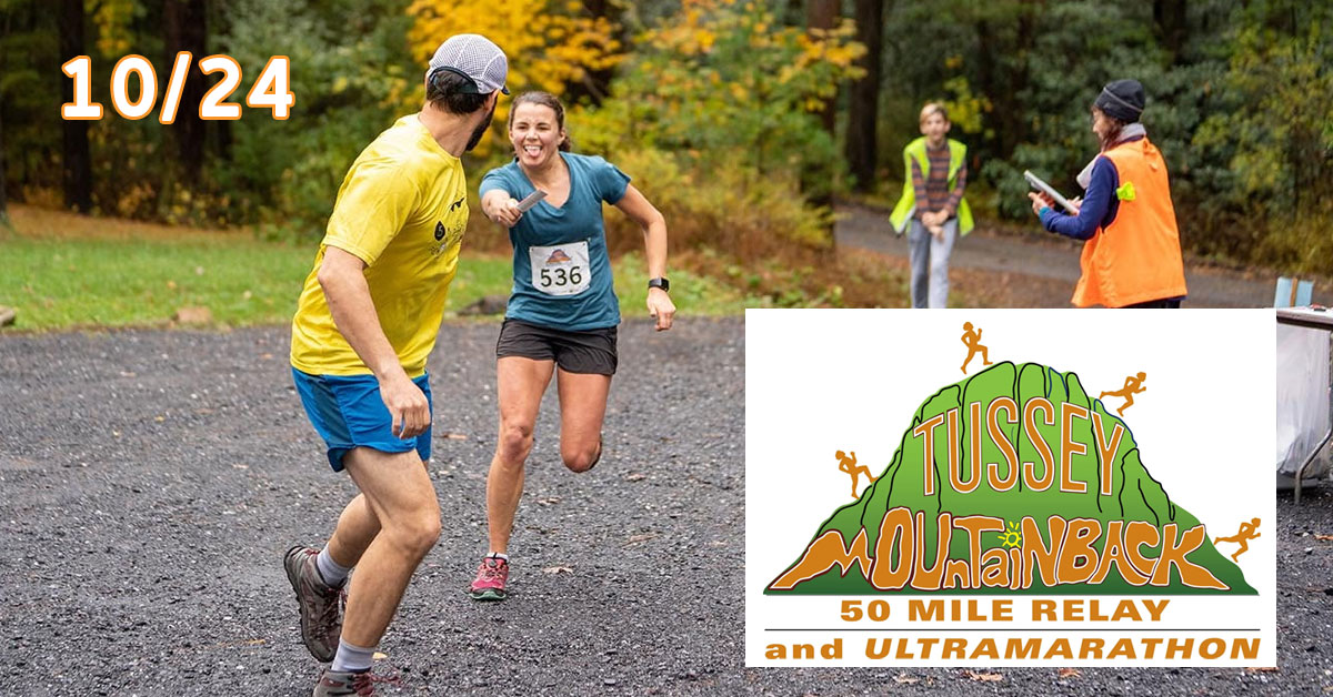 Tussey Mountainback Relay Racers at exchange point with volunteers